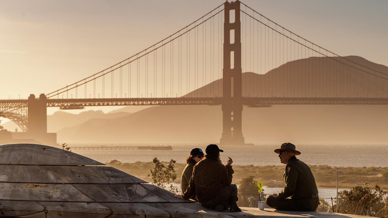 A park ranger greets visitors at Presidio Tunnel Tops.