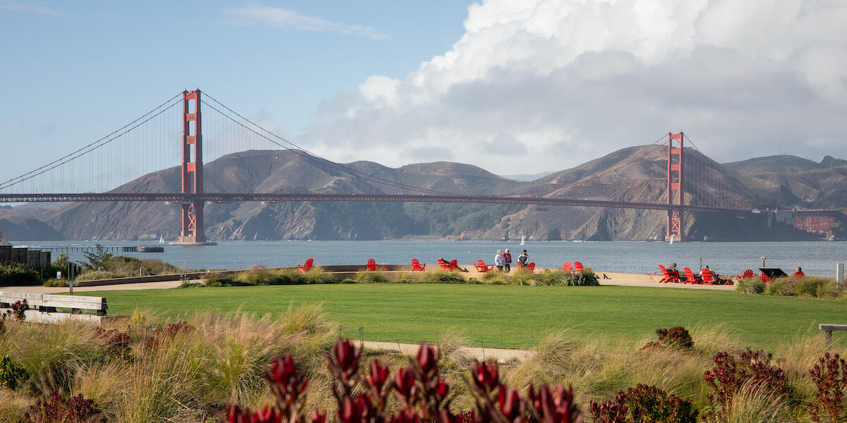 Golden Gate Bridge in background with Presidio Tunnel Tops in foreground.