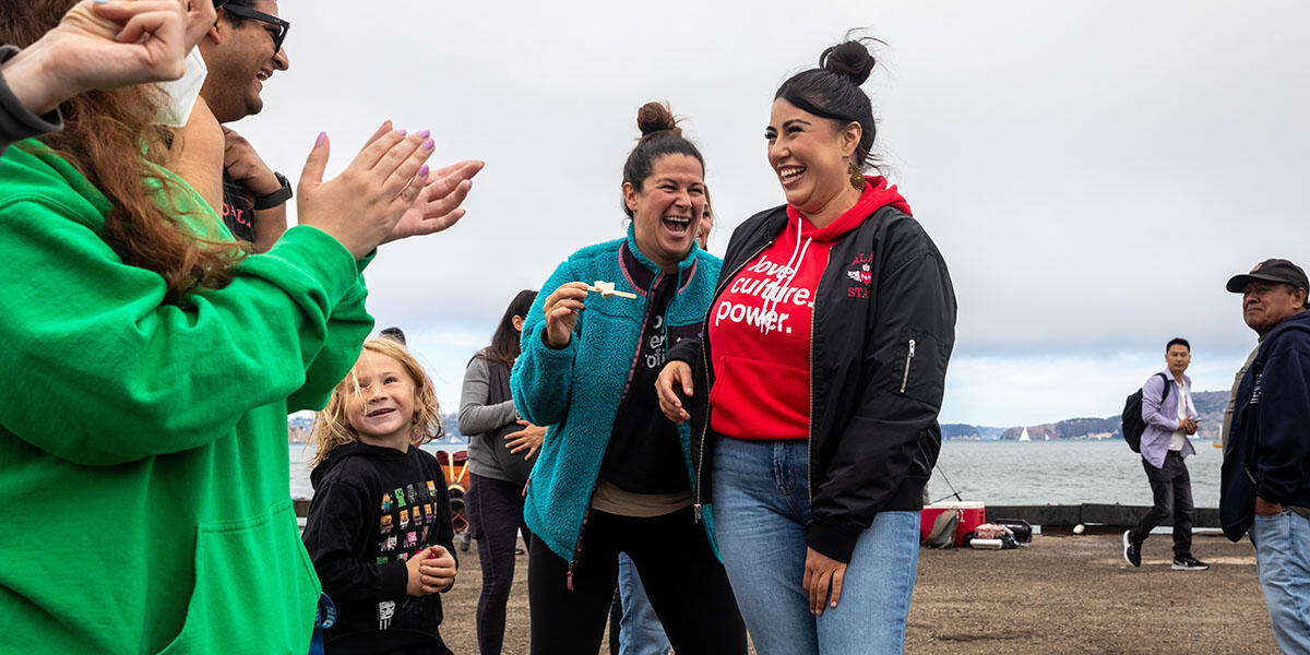 Participants from ALAS (Ayundando Latinos A Soñar) enjoying the "Raíces en la Bahía/Rooted in the Bay" event for farmworkers and their families in September 2024. Activities included crabbing, hiking, and beachside recreation.