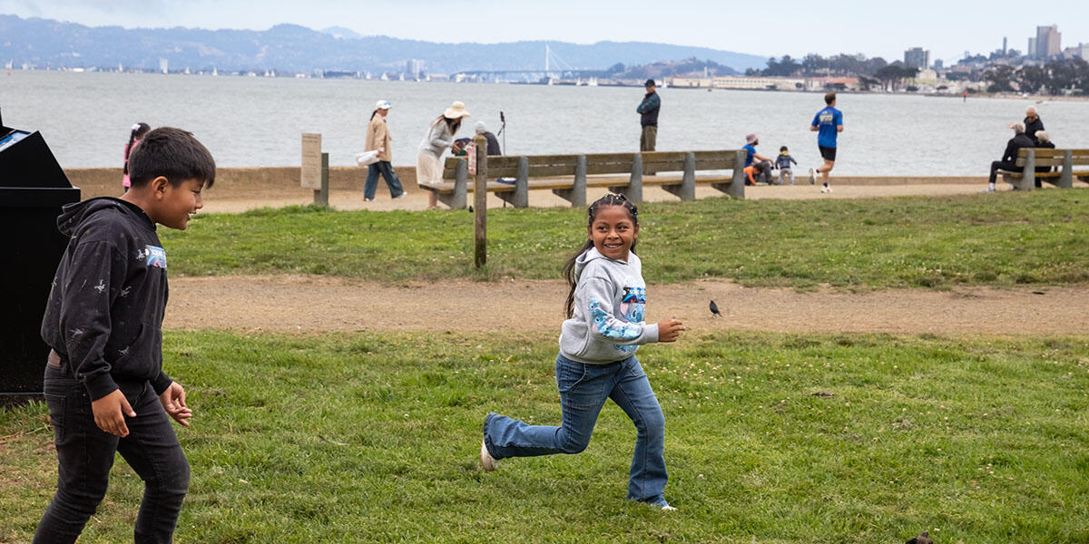 Participants from ALAS (Ayundando Latinos A Soñar) enjoying the "Raíces en la Bahía/Rooted in the Bay" event for farmworkers and their families in September 2024. Activities included crabbing, hiking, and beachside recreation.