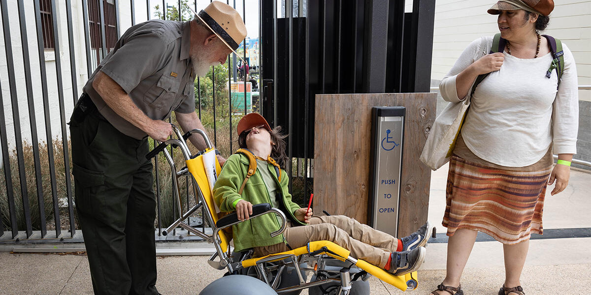 NPS Ranger greets an Access to Adventure Day attendee at the Presidio Tunnel Tops.