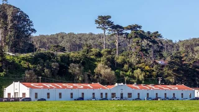 Two historic hangar buildings with the words