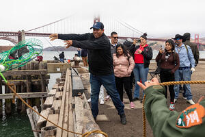 Participants from ALAS (Ayundando Latinos A Soñar) enjoying the "Raíces en la Bahía/Rooted in the Bay" event for farmworkers and their families in September 2024. Activities included crabbing, hiking, and beachside recreation.