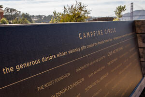A commemorative plaque at the Tunnel Tops Campfire Circle honors the donors who made the park possible.