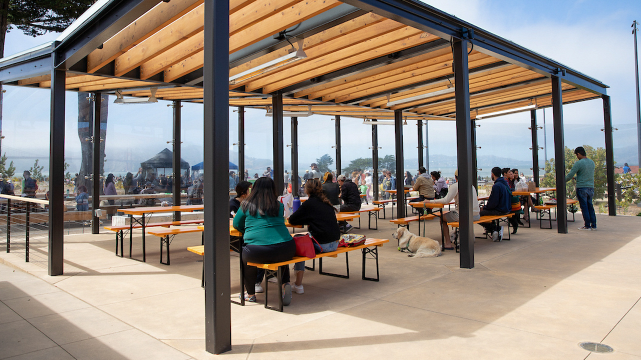Picnic Place at Presidio Tunnel Tops The Picnic Place at the Presidio of San Francisco Tunnel Tops. Visitors are sitting at picnic tables and enjoying a nice sunny day.