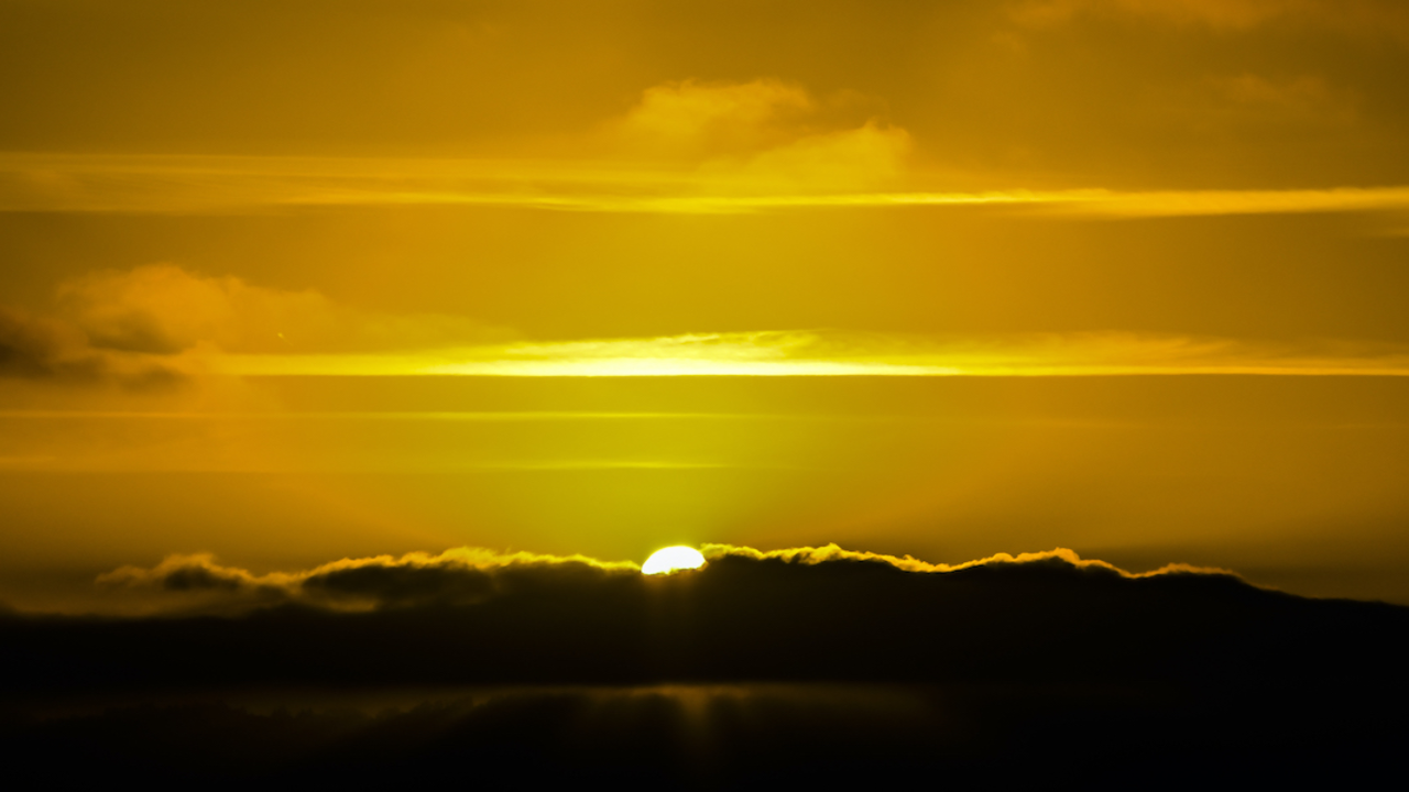 ALCA_170405_ATB_687_2x1.jpg Sun breaking through storm clouds