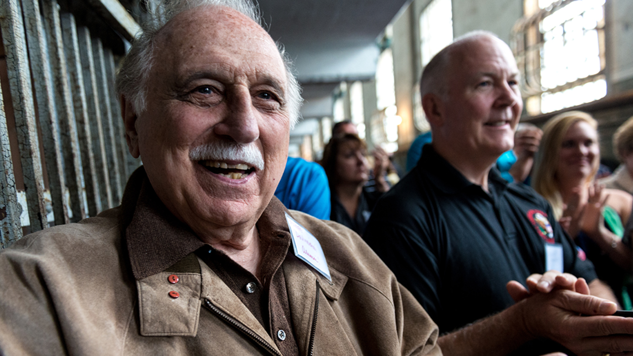 Former Alcatraz guard George DeVincenzi and other alumni participate in a reunion on the island in 2015. Former Alcatraz guard George DeVincenzi and other alumni participate in a reunion on the island in 2015.
