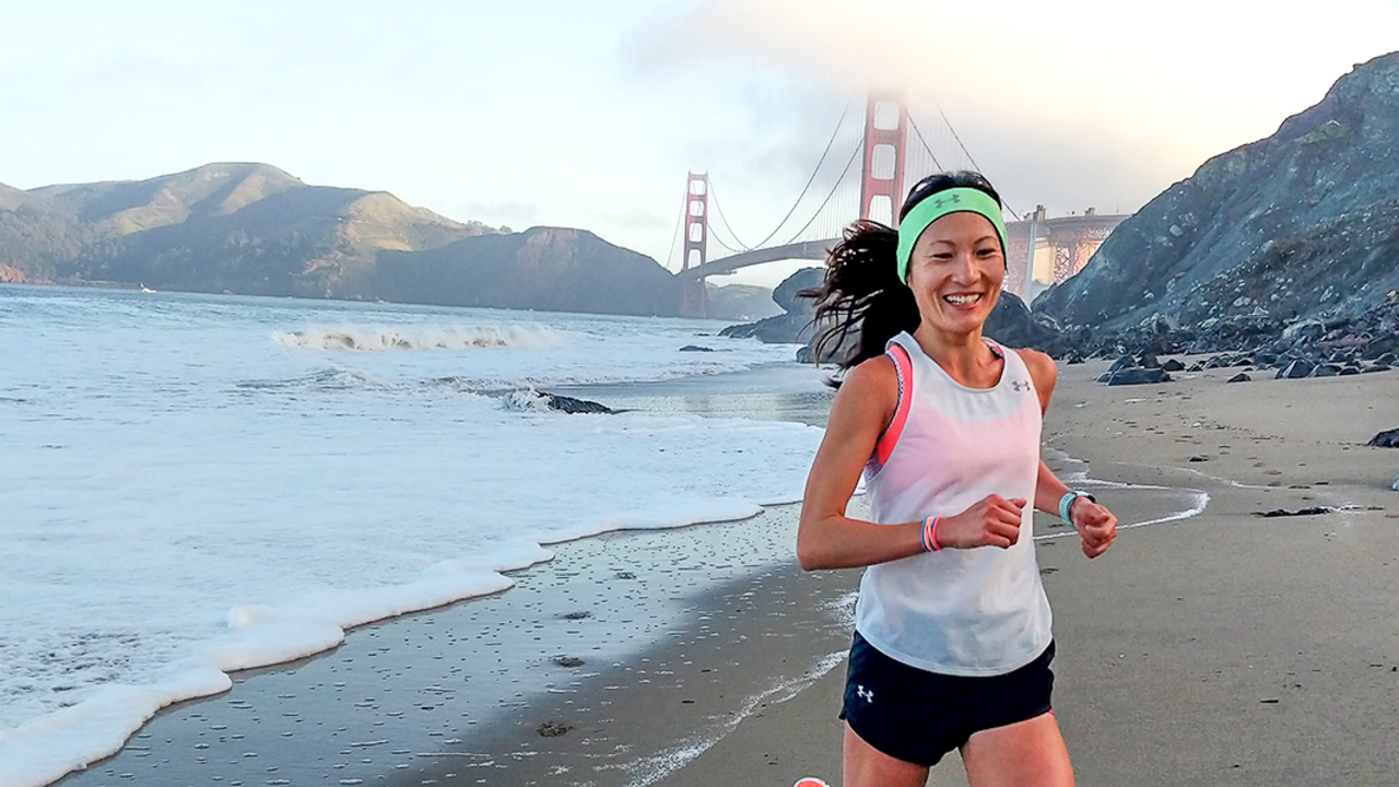 YiOu Wang running at Baker Beach YiOu Wang running at Baker Beach