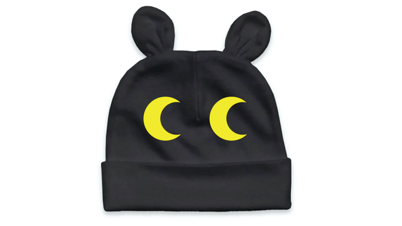 Black and yellow infant cap with animal eyes. Black and yellow infant cap with animal eyes.