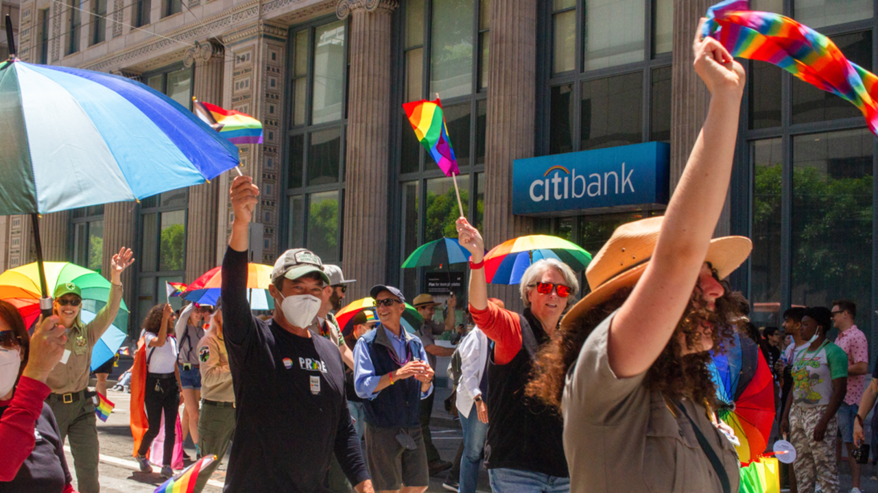 Golden Gate National Parks partners celebrating Pride 2022 Golden Gate National Parks partners celebrate Pride, waving rainbow flags and smiling to the crowd.