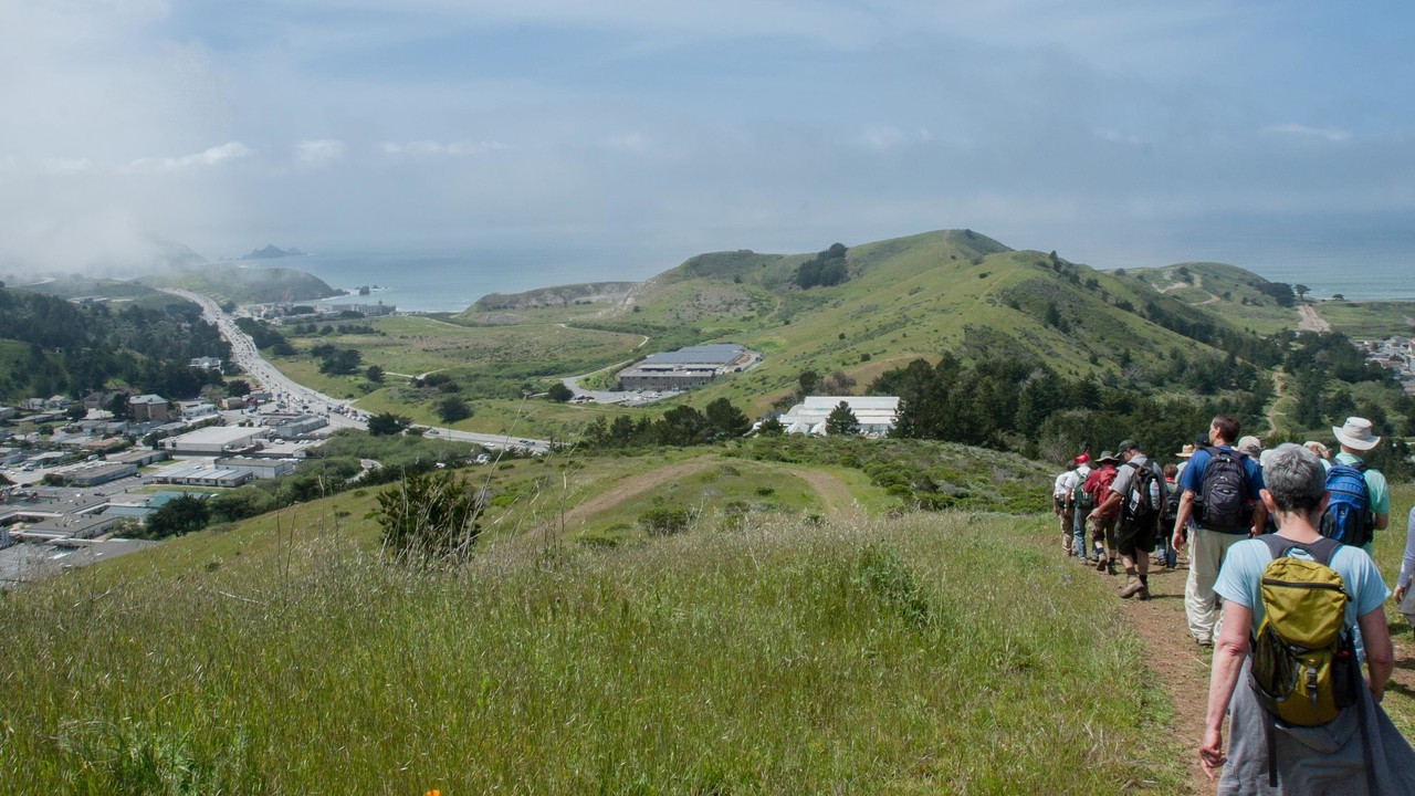 Hikers make their way down Sweeney Ridge Hikers make their way down Sweeney Ridge