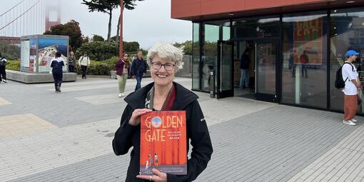 Photo of author Elizabeth Partridge in front of the Golden Gate Bridge Welcome Center.