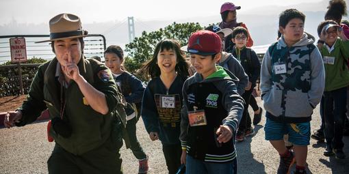 Ranger Kelsi Ju leads a class of students in the Marin Headlands