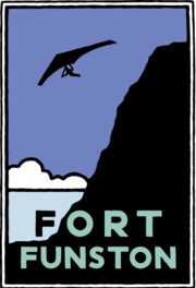 Fort Funston by Michael Schwab Schwab image of a hang glider soaring aside a steep, beach-side cliff